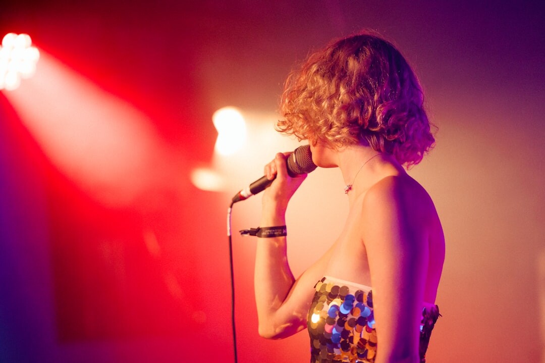 young singer performing live