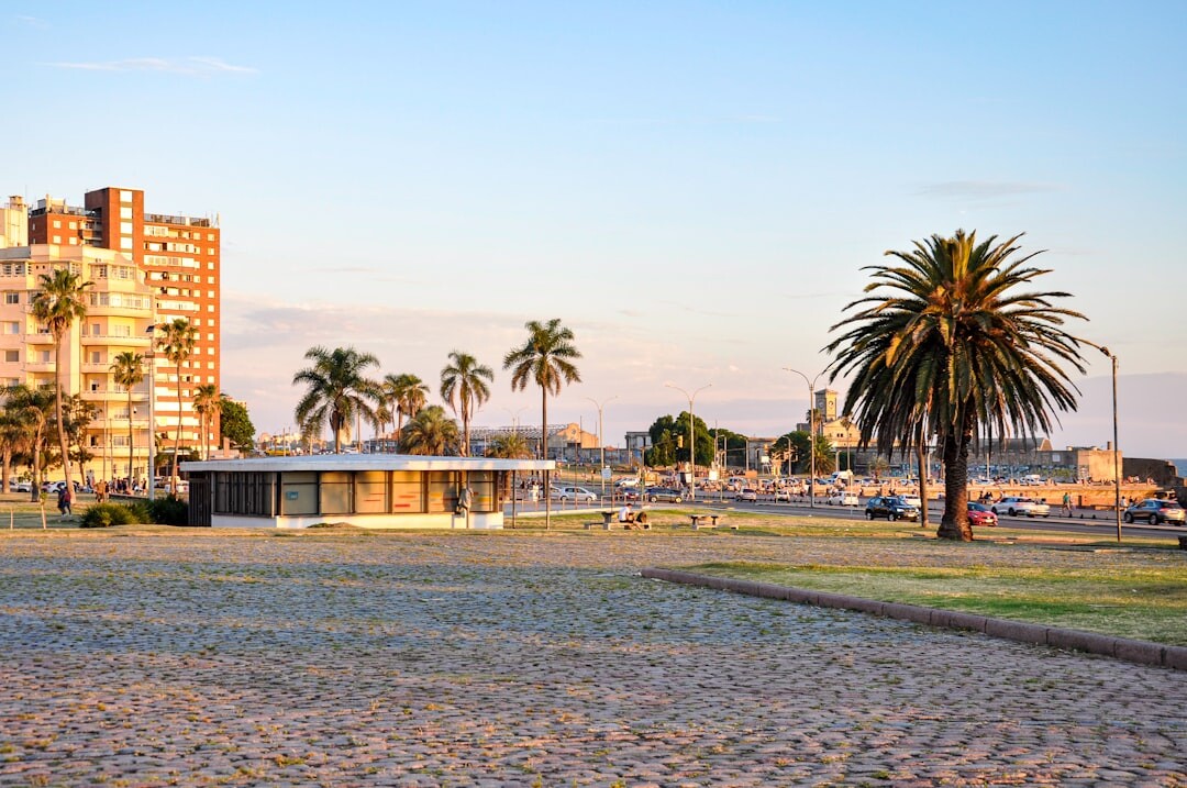 Montevideo Uruguay city skyline at sunset along the coastline