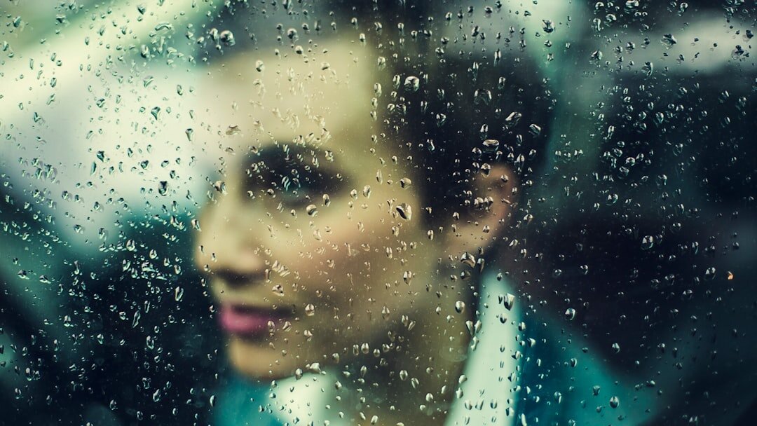 woman crying in rain