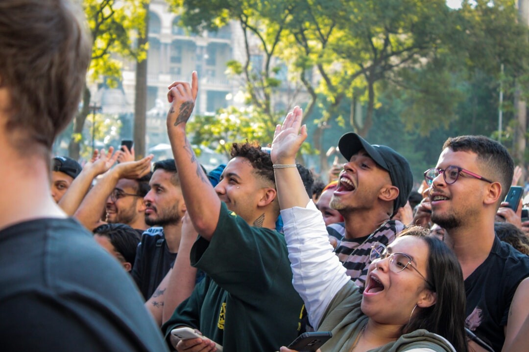 teen fans cheering at event